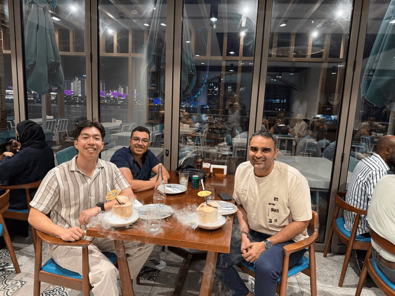 Surgence Labs team members sharing a meal together